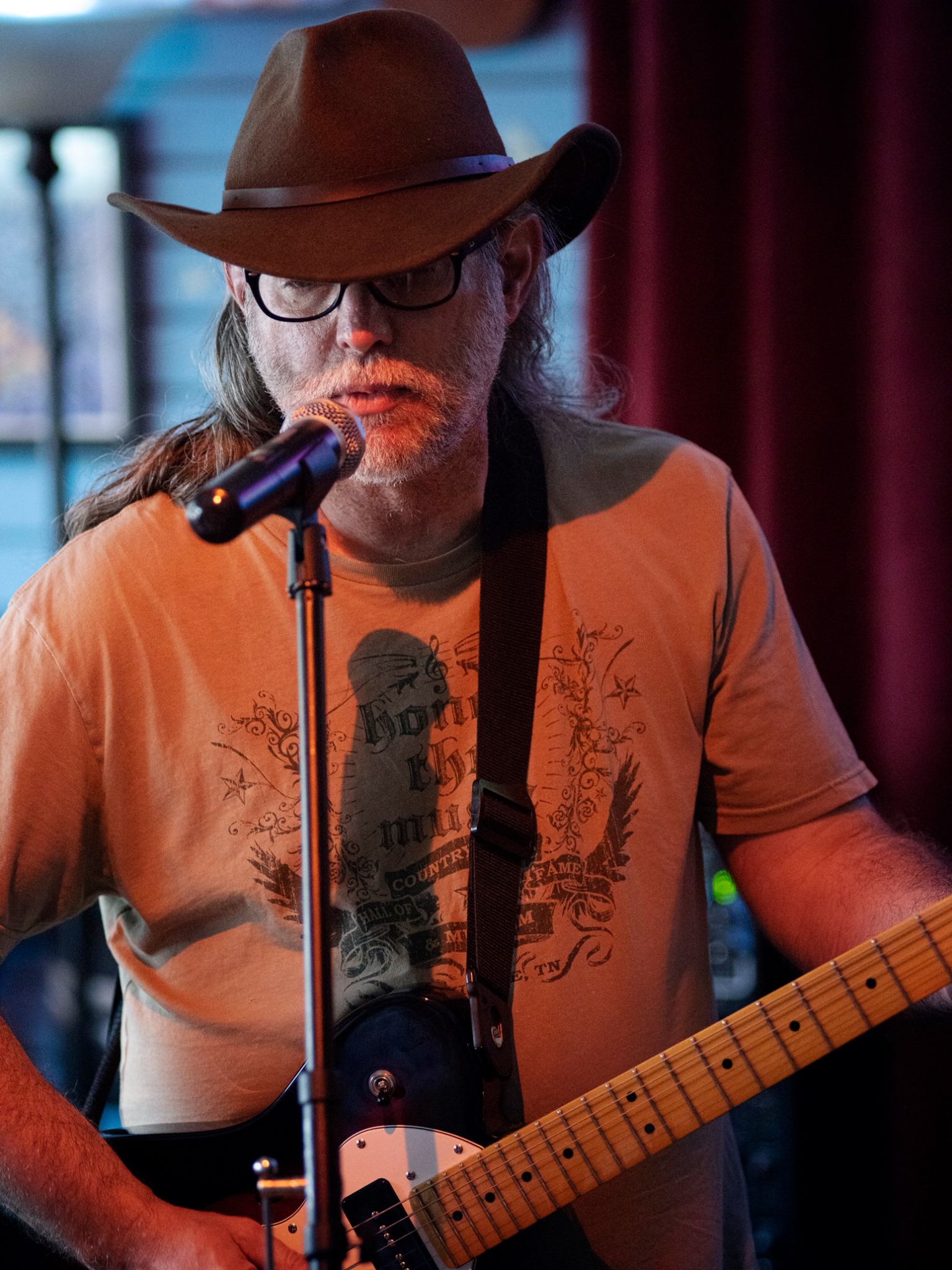 a man holding a guitar