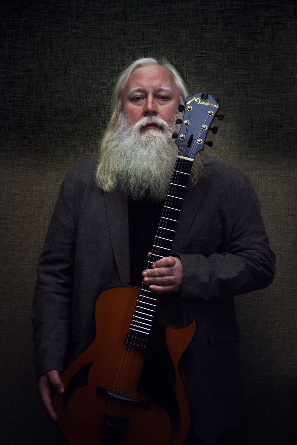 a person holding a guitar