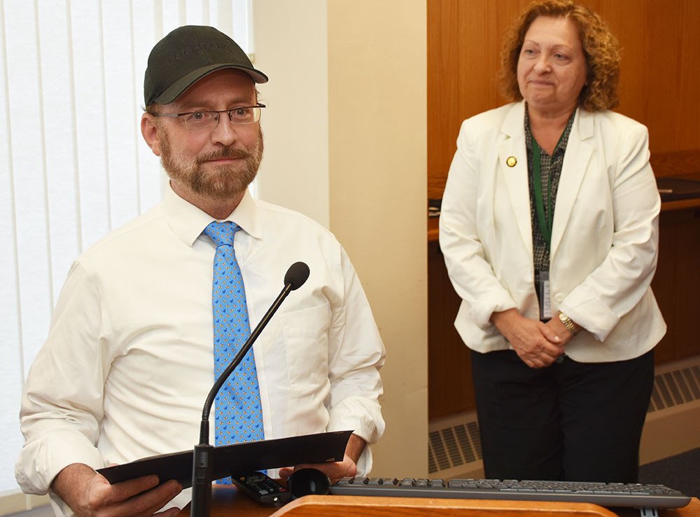 Benzion Brown accepting Camp Simcha award from Legislature Vice Chair Nadia Rajsz