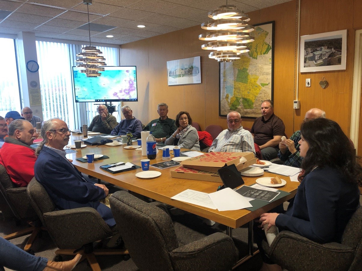 Group of people discussing light pollution