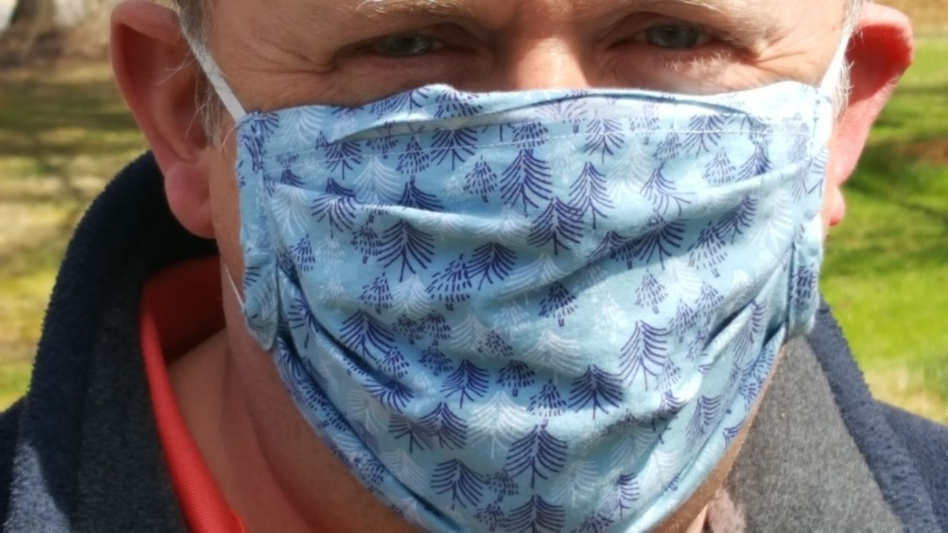 A person wearing a homemade mask