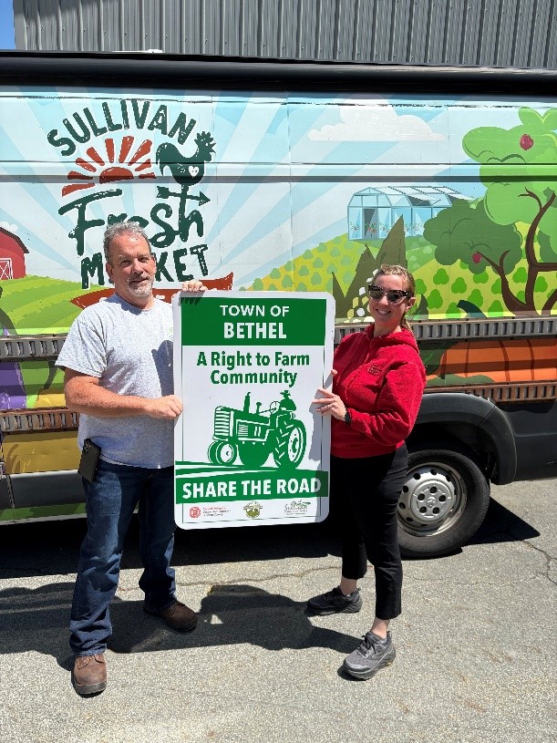 Charlie Kocher and Melinda Meddaugh with RTF Sign