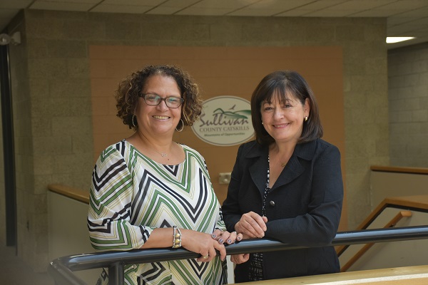 two women standing next to each other