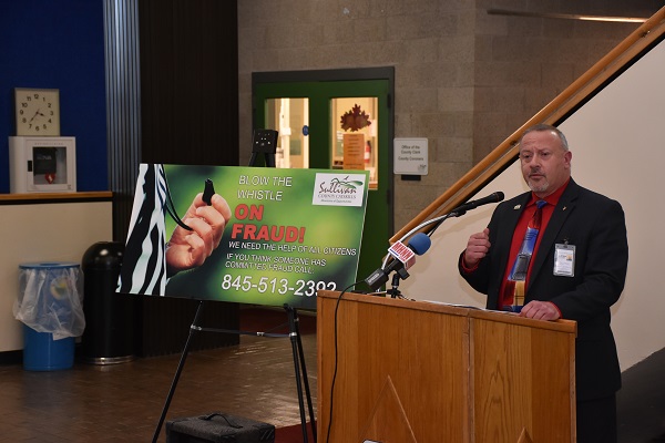 a man standing in front of a podium