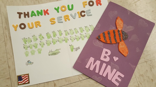 a close up of two valentines day cards